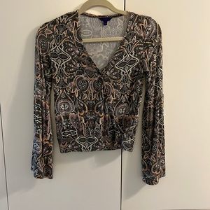 Wrap style blouse with bell sleeves